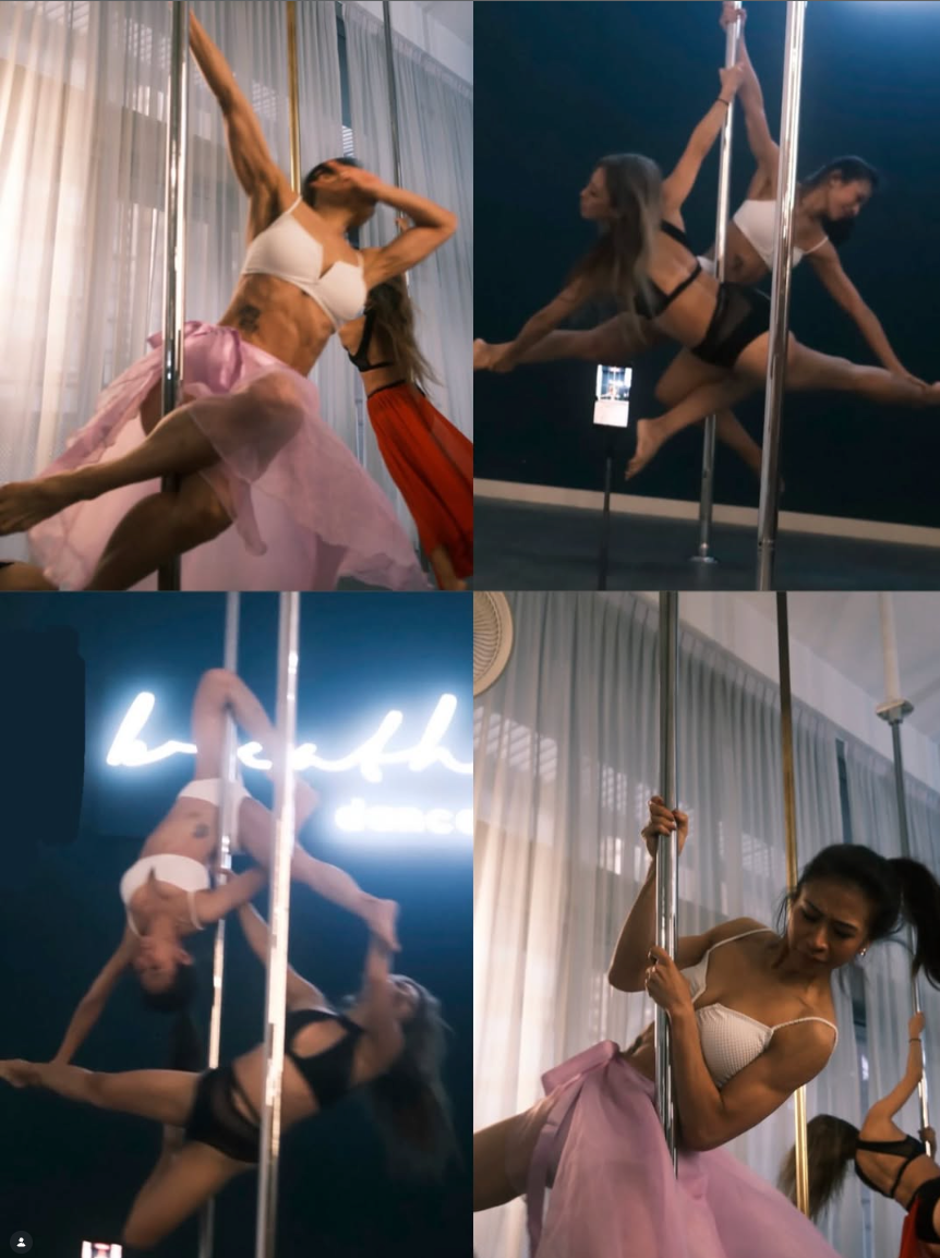 Margaret performing a pole pose in a white top and pink skirt